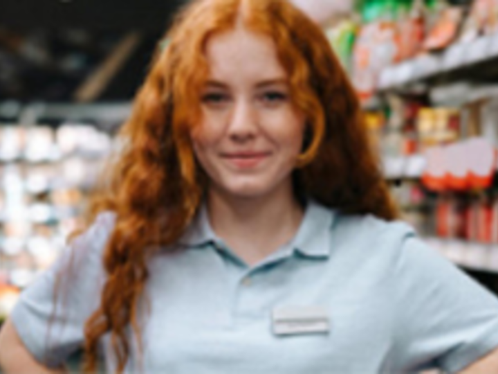 Young woman with nametag