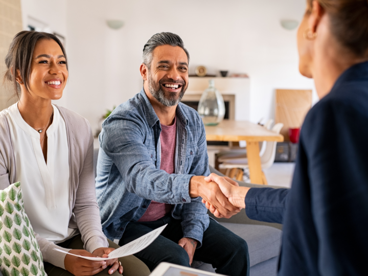 Man and woman shaking hands