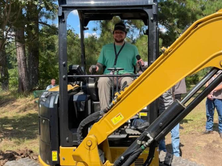 An RWS student working on a forklift. 