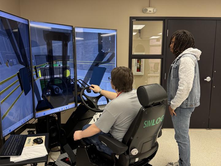 RWS students working on logistics simulator. 