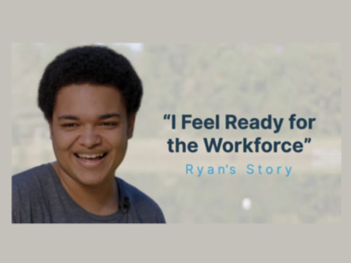 A headshot photo of Ryan smiling. 
