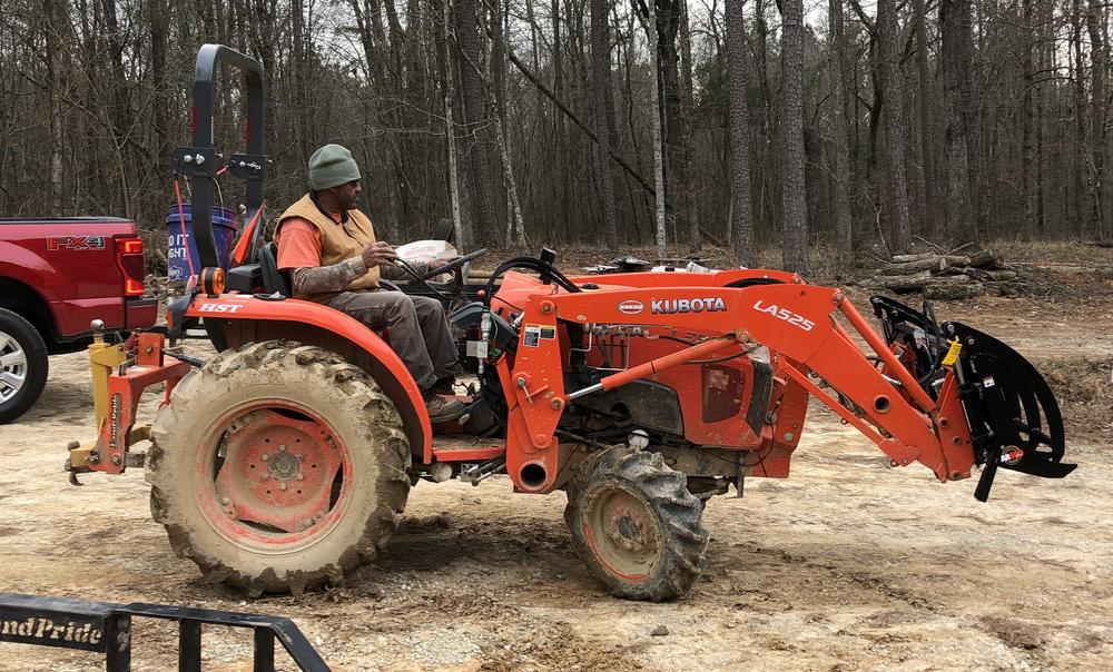 Iteago Felton on tractor