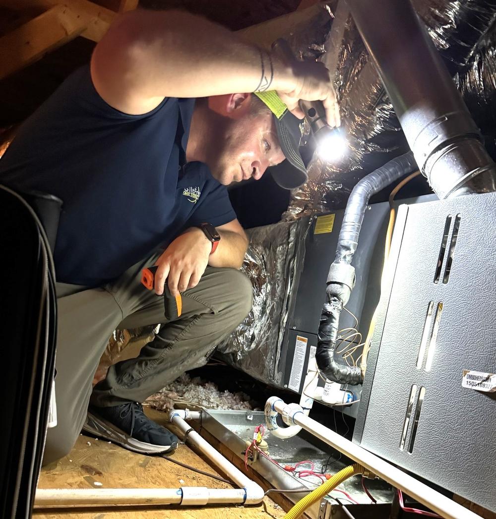 Shane Giltner inspecting home