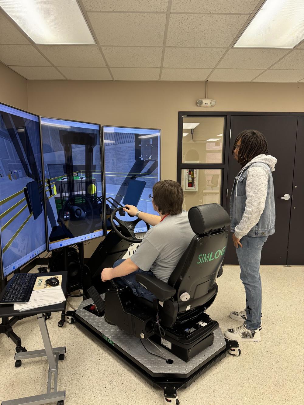 RWS students working on logistics simulator. 