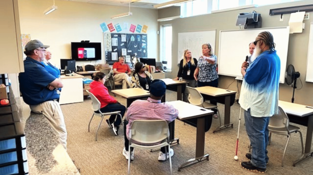 Participants gathered together in a classroom. 