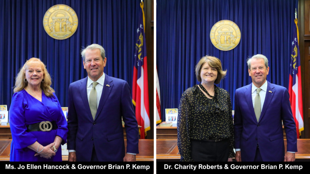 Governor Brian P. Kemp is wearing a navy-blue suit and new SRC Member Dr. Roberts is wearing a black pants and gold/black blouse. Governor Brian P. Kemp wears a navy-blue suit along with new SRC member Ms. Hancock wearing a light blue dress.